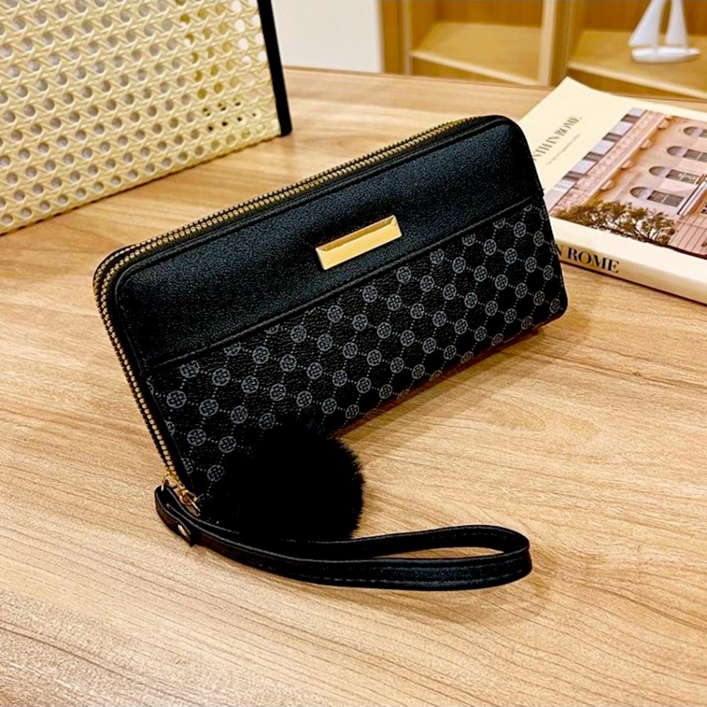 Women’s black and gray long, leather zipper wallet with Pom charm. New with tags
